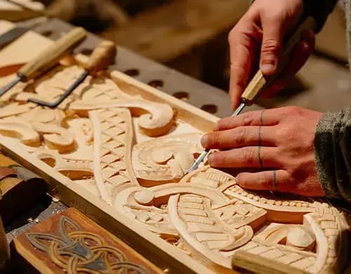 Wood carving artisan at work