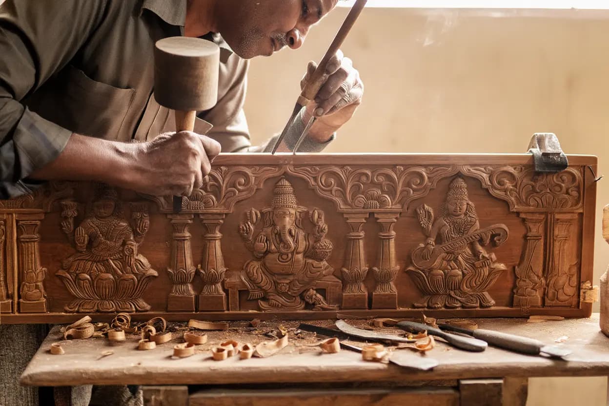 Wood carving artisan at work